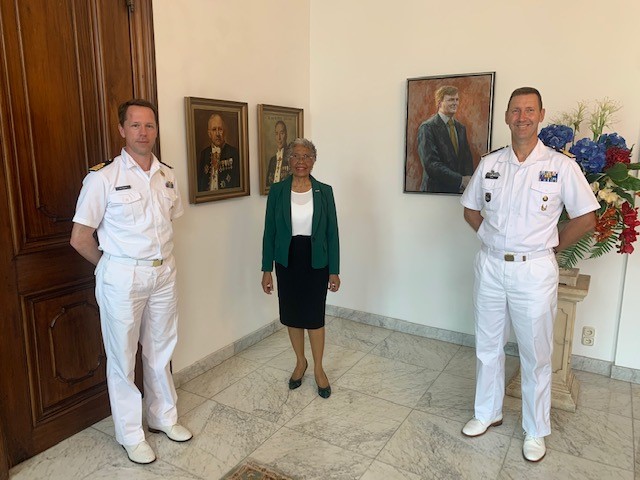 Commander of Zr. Ms. Holland meets the Governor of Curaçao