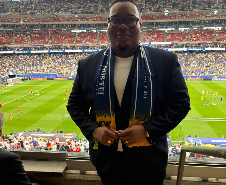 Parliament Defends Brownbill’s World Cup Trip as Criticism Focuses on Length and Cost of Visit