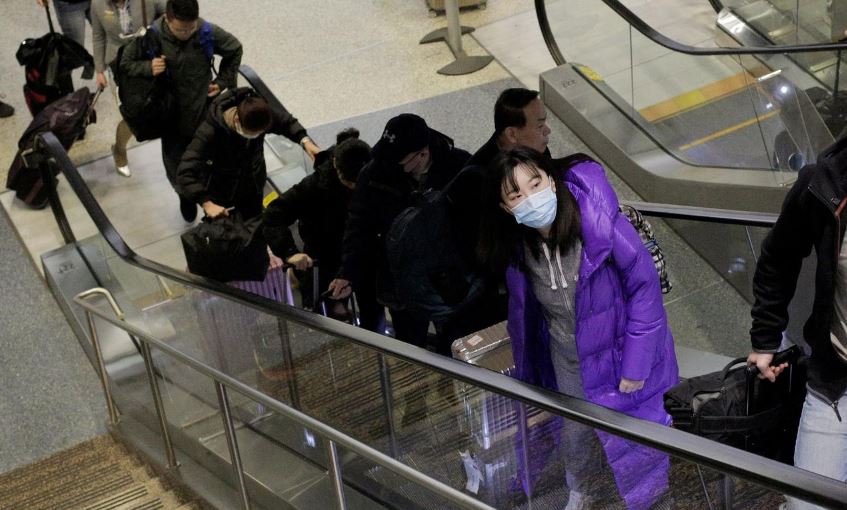 China's new coronavirus cases drop, but world still on alert