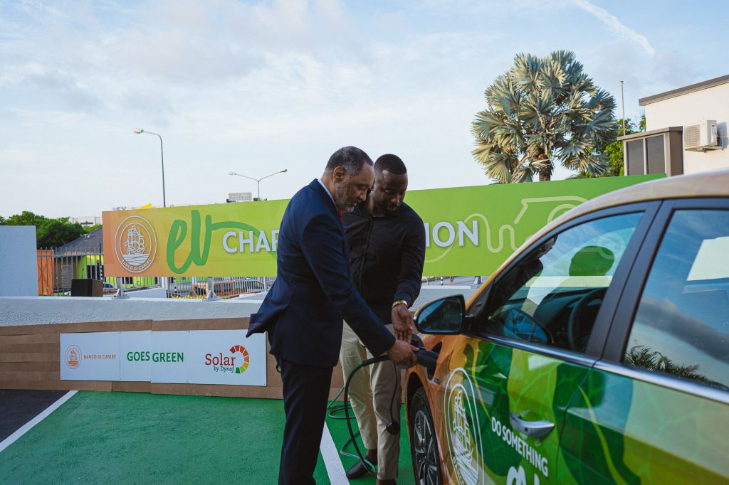 Banco di Caribe goes green … with solar panels and EV charging station…