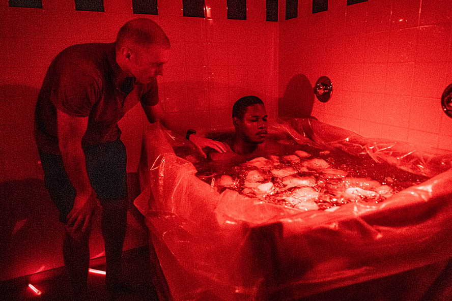 Soldiers take ice bath in the tropics