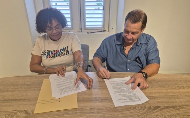 Slavery Remembrance Committee and Stichting NAAM Sign Agreement to Preserve Caribbean Heritage Through 2029