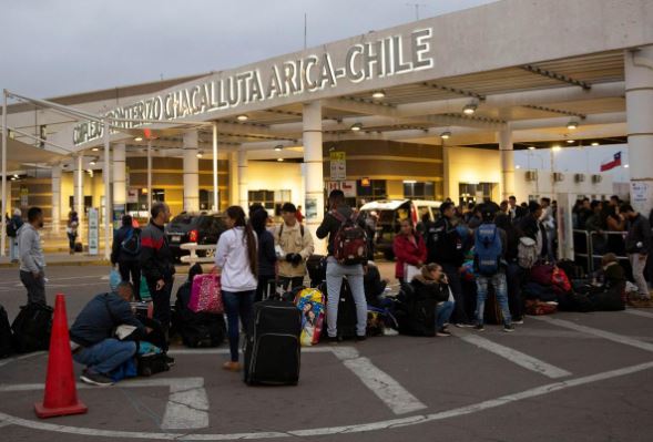 About 200 mostly Venezuelan migrants stuck at Chile-Peru border